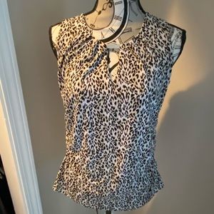 White House Black Market sleeveless top. Animal print.